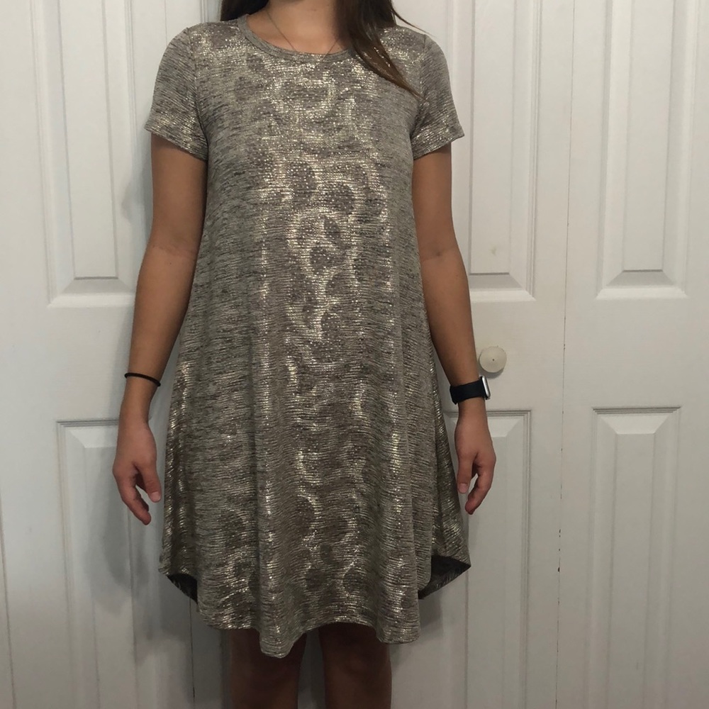Grey and gold sparkly dress.